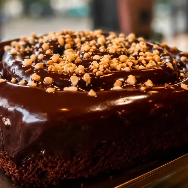C H O C O L A T E F U D G E C I N N A M O N R O L L SFreshly baked, served warm, generously drizzled with rich chocol...